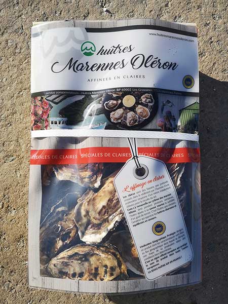 l'huître Spéciale de Claire Marennes Oléron | conditionnement en du bois certifié PEFC pour une gestion durable des forêts.